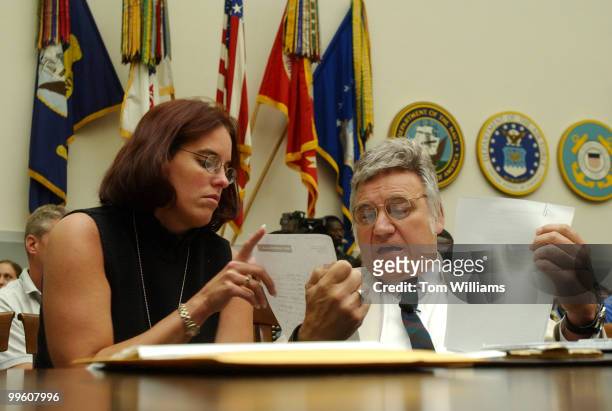 Rep. James Traficant, D-Ohio, talks with staffer Lori Pesci during a break the House Ethics Committee hearing which is investigating him, Wednesday.