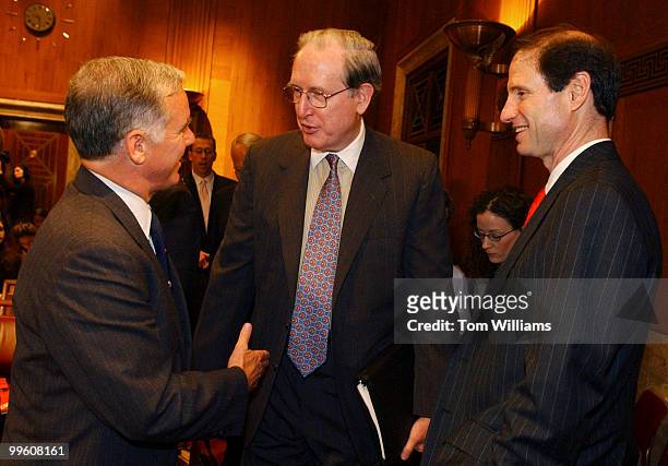 Sen. John D. Rockefeller, D-W.V., center, greets Gov. Howard Dean, D-Vt., left, who is representing the National Governors Association and Sen. Ron...