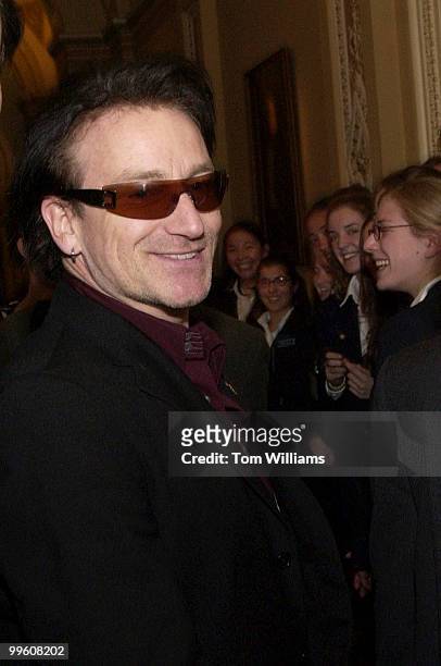 Bono, of the rock group U2, leaves a meeting with Sen. Tom Daschle, D-S.D., Friday afternoon in the Capitol.