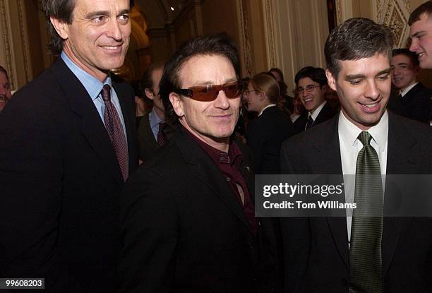 Bono, of the rock group U2, leaves a meeting with Sen. Tom Daschle, D-S.D., Friday afternoon in the Capitol.