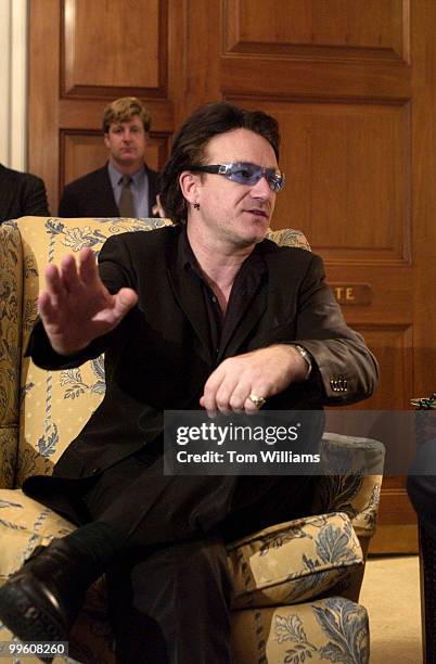 Bono, of the group U2, talks to House Minority Leader, Dick Gephardt, D-Mo., about U.S. Assistance to Africa to help that continent's debt relief and...