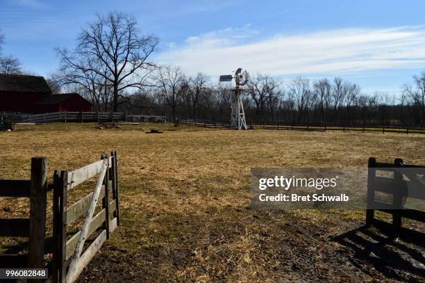 windmill grazing - bret schwalb stock pictures, royalty-free photos & images