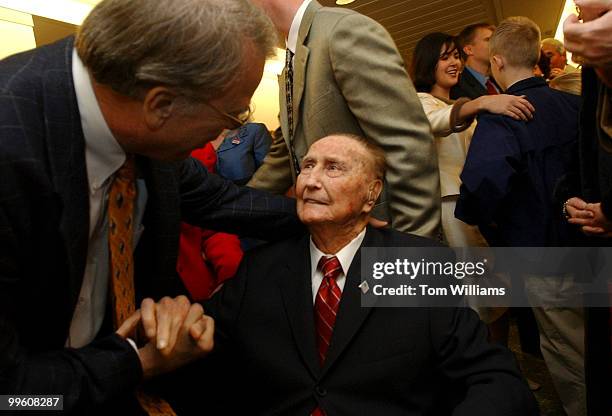 Sen. Strom Thurmond, R-S.C., is greeted by his nephew, Billy Thurmond of North Augusta, S.C., before the Senator's 100th birthday party, Thursday.