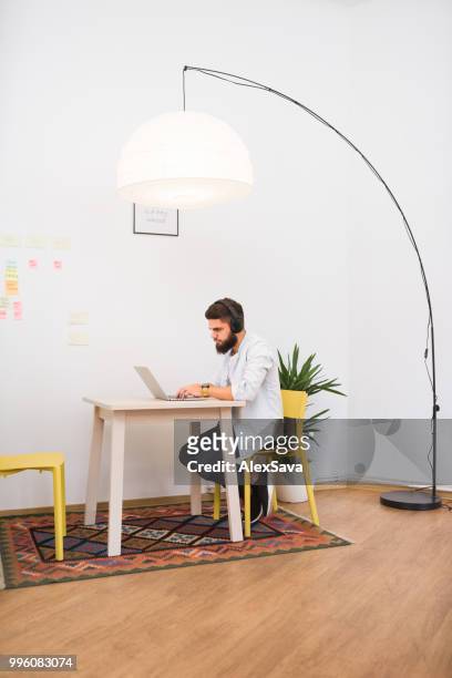 caucasian man working at the office - rgb stock pictures, royalty-free photos & images