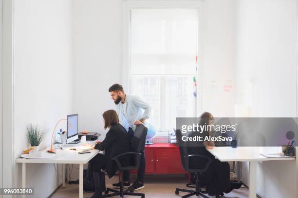 people working in small design studio - rgb stock pictures, royalty-free photos & images