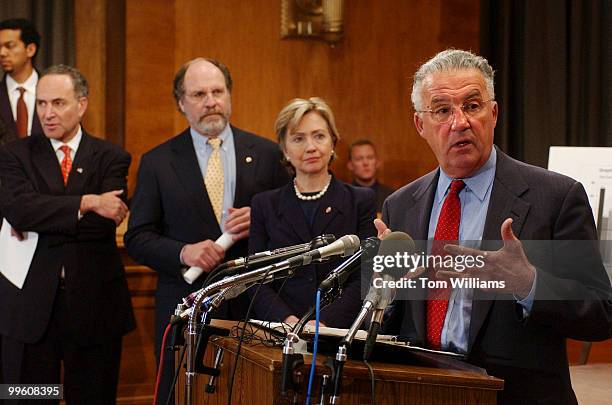 Sen. Paul Sarbanes, D-Md., speaks at a news conference to introduce "The Predatory Lending Consumer Protection Act of 2002." Also pictured from left...