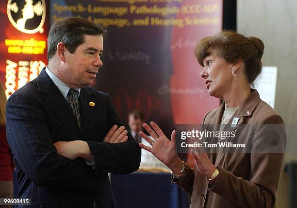 Rep. Jim Walsh, R-N.Y., speaks with Nancy Creaghead, president of American Speech-Language-Hearing Association at the Congressional Health Fair whick...