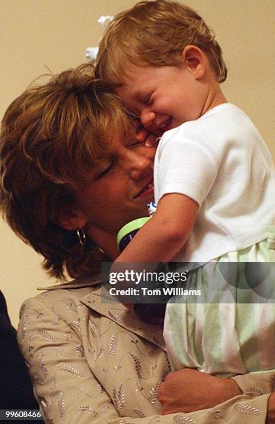 Karen Kasich with daughter Reese, 28 months, attend a ceremony for former Congressman and Chairman of the House Budget Committee, John Kasich,...