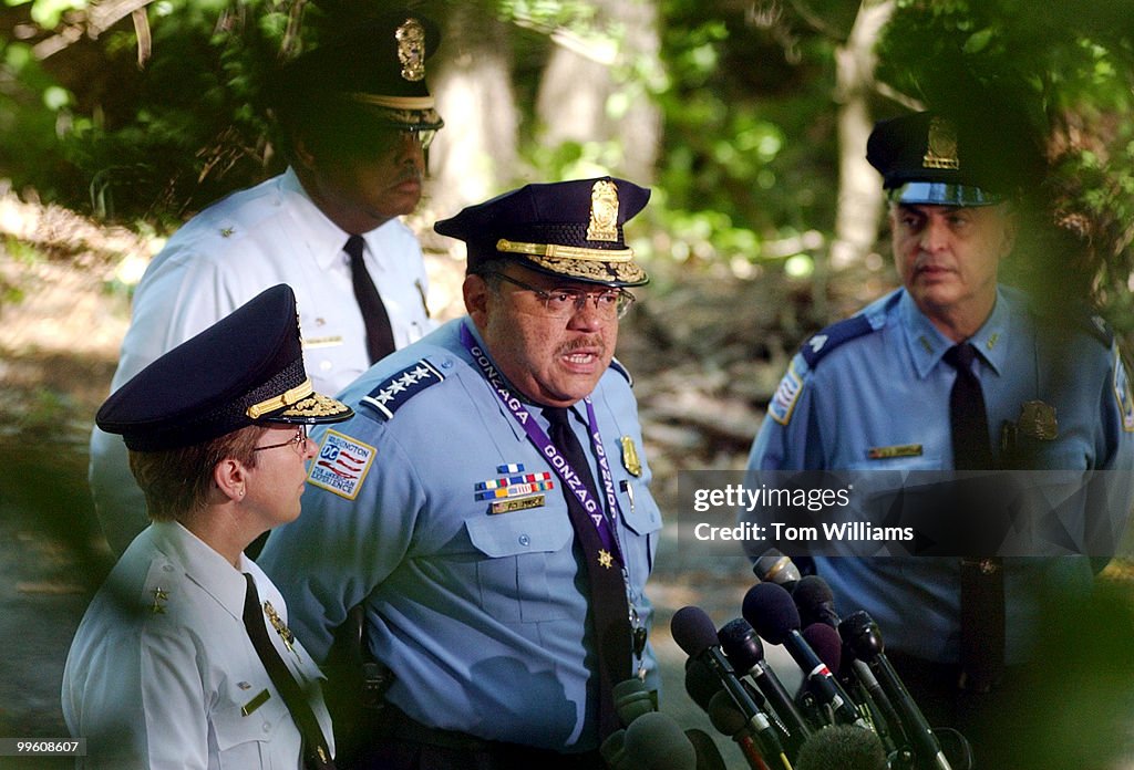 A D.C. Chief Charles Ramsey, center, speaks to the press in