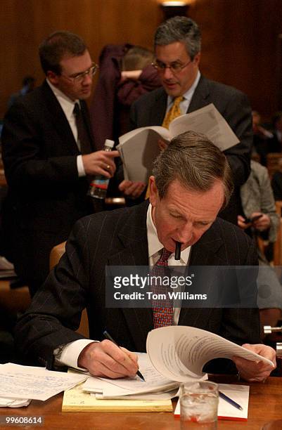 Michael Patterson and Eric Peiffer, background at left, both of J.P. Morgan Chase & Co., prepare to testify at the Enron Permanent Investigations...