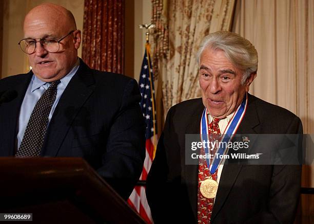 Rep. Ben Gilman, R-N.Y., right, is congratulated by Deputy Secretary of State, Richard Armitage, after accepting The Secretary's Distinguished...