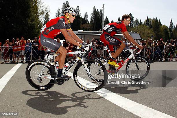 Lance Armstrong of Team Radio Shack and Marcus Burghart of Germany of Team BMC Racing the start of Stage One of the Tour of California on May 16,...