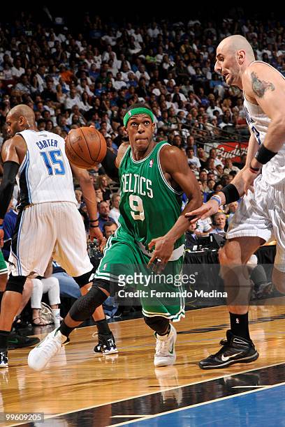 Rajon Rondo of the Boston Celtics drives against Marcin Gortat of the Orlando Magic in Game One of the Eastern Conference Finals during the 2010 NBA...