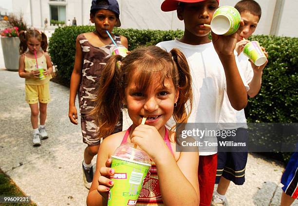 Sierra Lopez and her friends from left Summer Kenee Christopher Gibson Taijeem Gibson and brother Seth Lopez keep cool with "slurpies" while touring...