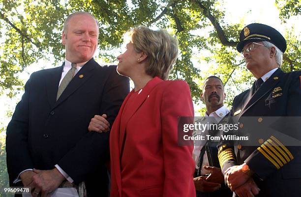 Rep. Joe Crowley, D-N.Y., and Sen. Hillary Clinton, D-N.Y., appear at a press conference introducing a measure to award Public Safety Officer Medals...