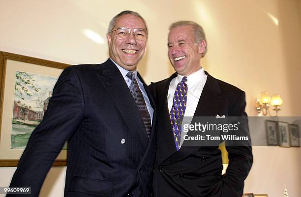 General Colin Powell and Sen. Joe Biden, D-DE, share a light moment during a photo op before question and answer session with the press, in Russell...