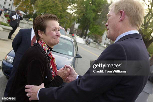 Rep. Richard Gephardt, D-Mo., speaks to JoAnn Duplechin after a press conference on aviation security legislation. Duplechin, a flight attendant for...