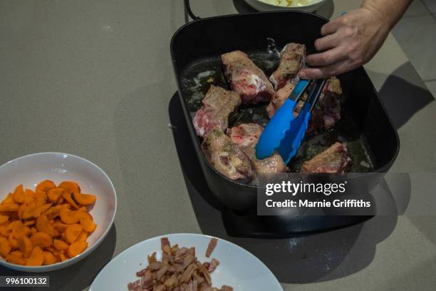 lamb stew preparation - lamb stew stock pictures, royalty-free photos & images