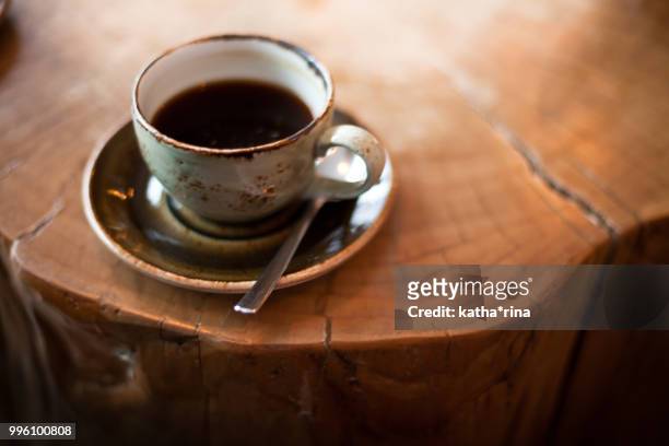 beloved warming cup of coffee . - katha stock pictures, royalty-free photos & images