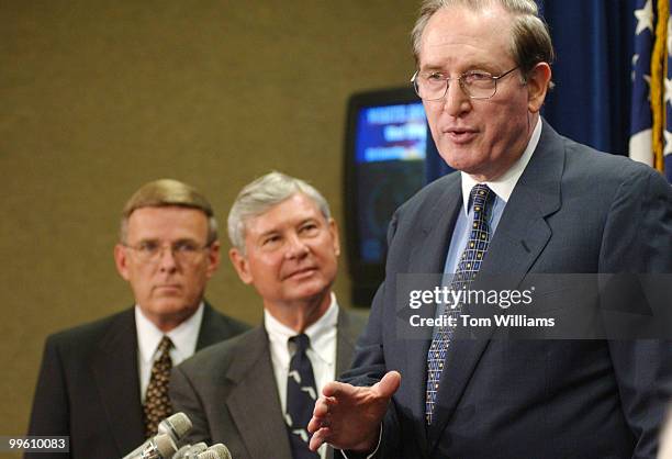 Sen. John D. Rockefeller, D-WV, speaks at a press conference urging President Bush to add a prescription drug benefit to Medicare, while Sens. Byron...