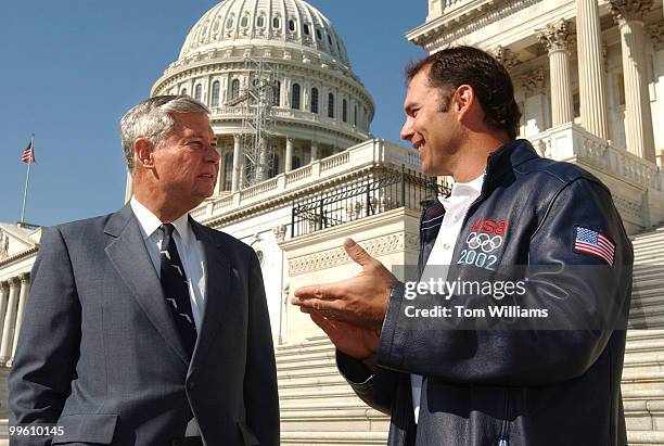 Brian Shimer of Naples, Fla., right, speaks with Sen. Bob Graham, D-Fla., on the East Front of the U.S. Capitol. Shimer was the driver of the USA-2...