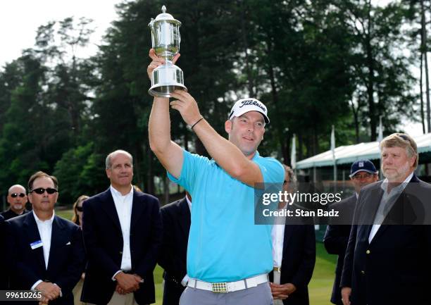 Justin Hicks holds the winner's trophy after the final round of the BMW Charity Pro-Am presented by SYNNEX Corporation at the Thornblade Club on May...