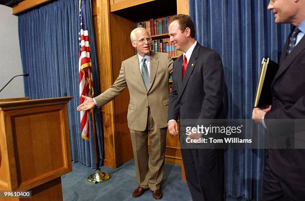 Rep. Chris Shays, R-CT, invites Rep. Adam Schiff, D-CA, to speak at a press conference in the House Studio on Campaign Finance Reform.