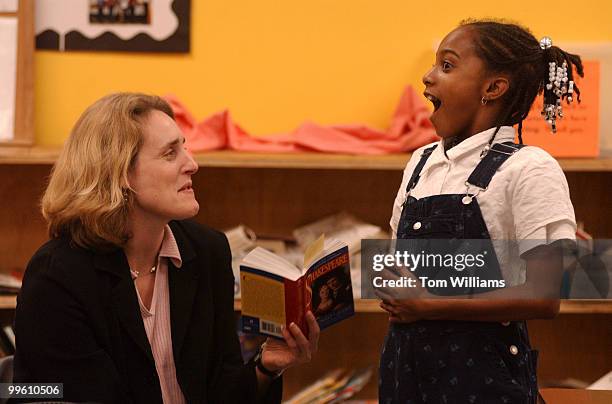 Tutor Karen Woodsen helps Felicia Turner recite Shakespeare, during a Project Northstar tutoring session on Tuesday night at the Beacon House...