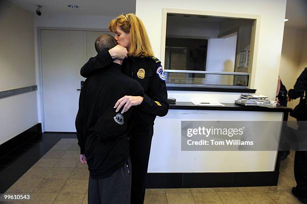 Off. Pamela Jordan of the U.S. Capitol Police hugs fellow officer Aidan Sims at headquarters on the day he was released from in-patient treatment at...