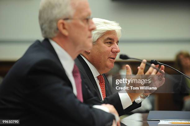 Former AIG CEO's Robert Willumstad, left, and Martin Sullivan, testify before a House Oversight and Government Reform Committee hearing on the...