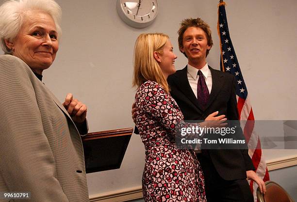 Clay Aiken, finalist on the TV show Amercian Idol, hugs his friend from grade school Kate Heath, from the office of Sen. John Edwards, D-N.C., during...