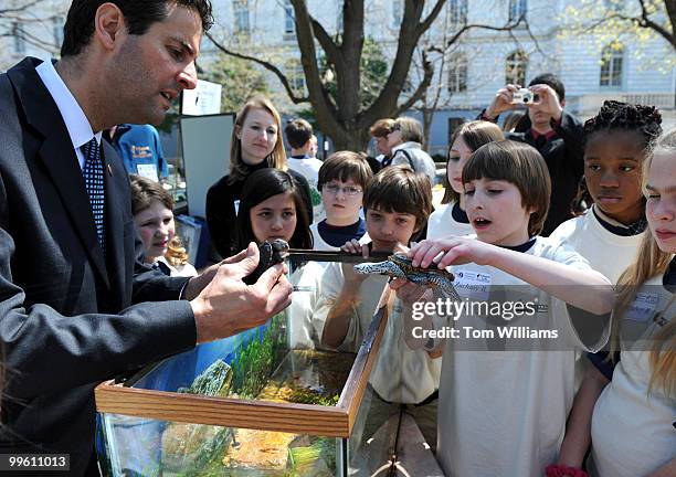 Rep. John Sarbanes, D-Md., is shown Diamondback Terrapins by Zach Bell and other fifth-graders from South Shore Elementary in Crownsville, Md., after...