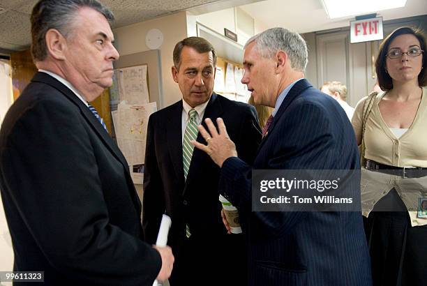 From left, Rep. Peter King, R-N.Y., House Minority Leader John Boehner, R-Ohio, and Rep. Mike Pence, R-Ind., prepare for a news conference to...