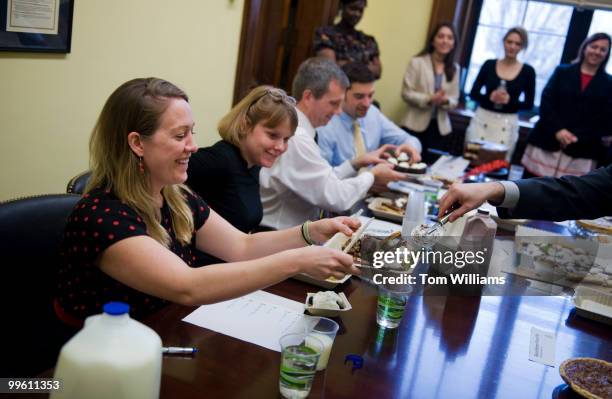 From left, Amber Johnson, from the office of Sen. Mike Enzi, R-Wyo., Alice James, from the office of Lindsey Graham, R-S.C., John Vezina from the...