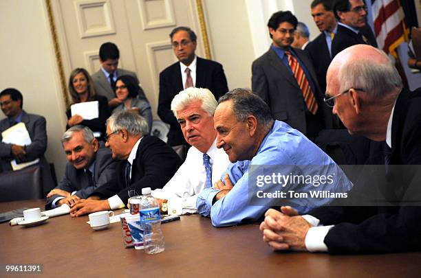 From left, Sen. Jack Reed, R-R.I., House Financial Services Committee Chairman Barney Frank, D-Mass., Senate Banking Committee Chairman Chris Dodd,...