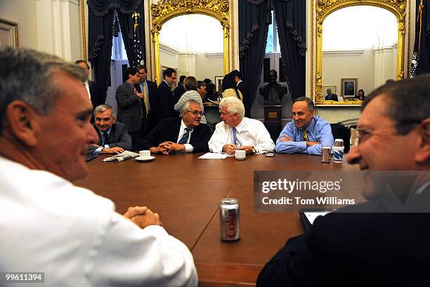 From left, Sen. Jack Reed, R-R.I., House Financial Services Committee Chairman Barney Frank, D-Mass., Senate Banking Committee Chairman Chris Dodd,...