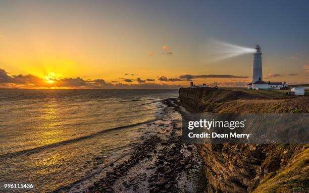 nash point sunset - sunset point stock pictures, royalty-free photos & images