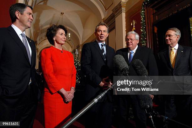 British Prime Minister Tony Blair speaks to the media upon Blair's arrival on the Hill to meet with Congressional leaders. From left are, Senate...