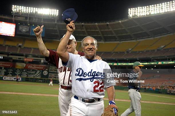 Rep. Joe Baca, D-Calif., leaves the game after pitching for the democrats at the 46th Annual Roll Call Congressional Baseball Game. Rep. Bill...
