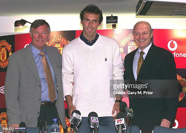 Laurent Blanc is unveiled as Manchester United's new signing at a press conference with manager, Alex Ferguson, and chief executive, Peter Kenyon at...