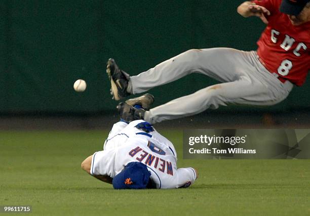 Rep. Anthony Weiner, D-N.Y., crashes to the grass as Rep. Jim Marshall, D-Ga., goes flying over him at the 46th Annual Roll Call Congressional...