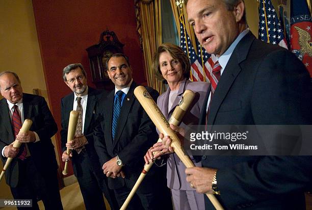 From left, Reps. John Spratt, D-S.C., David Obey, D-Wis., Joe Violante, Disabled American Veterans, Speaker Nancy Pelosi, D-Calif., and Rep. Chet...