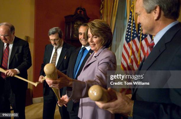 From left, Reps. John Spratt, D-S.C., David Obey, D-Wis., Joe Violante, Disabled American Veterans, Speaker Nancy Pelosi, D-Calif., and Rep. Chet...