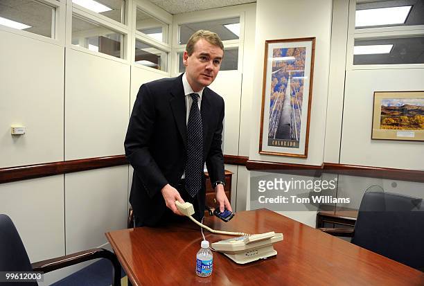 Michael Bennet, appointee to the Senate seat vacated by Sen. Ken Salazar, D-Colo., speaks on the phone in his Hart Building office, January 5, 2009.
