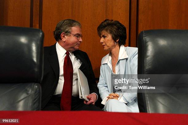 Former National Security Advisor Sandy Berger speaks with Sen. Barbara Boxer, D-Calif., after he testified at a hearing before the Senate Foreign...