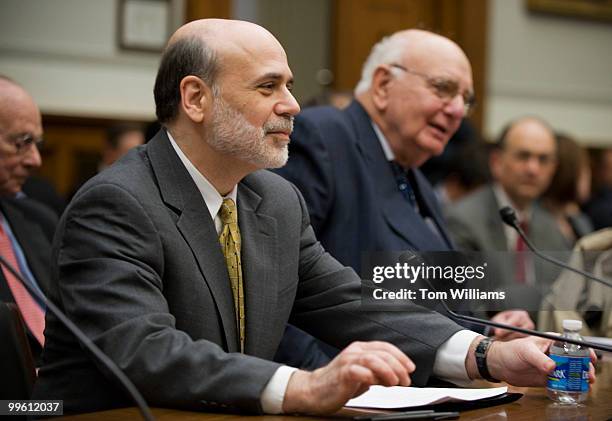 Chairman of the Federal Reserve Ben Bernanke, left, and Paul Volcker, chairman of the President's Economic Recovery Advisory Board, prepare to...