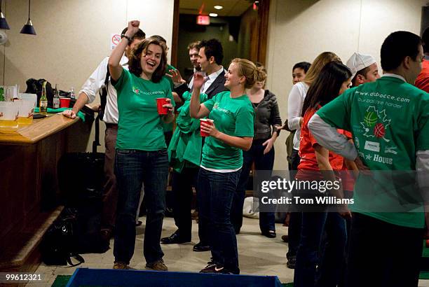 Katie Bell, right, and Alison Chiaramonte celebrate a throw during indoor bocce ball competition at the American Legion on Capitol Hill, Oct. 21,...