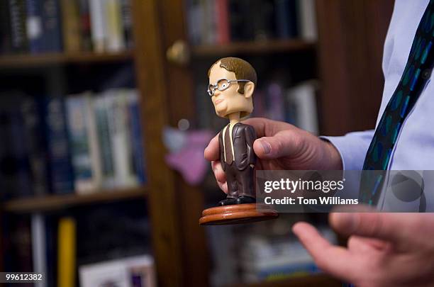 Rep. Bruce Braley, D-Iowa, talks about a Dwight Schrute bobblehead, during a tour of his office, March 12, 2010.
