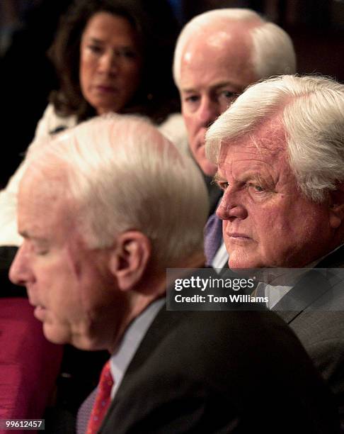 Sen. John McCain, R-Ariz., speaks at a hearing before the Senate Foreign Relations Committee on North American border security with, from right, Sen....