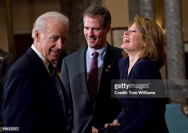 Sen. Scott Brown, R-Mass., participates in a ceremonial swearing in with his wife Gail Huff and Vice President Joe Biden in the Old Senate Chamber,...